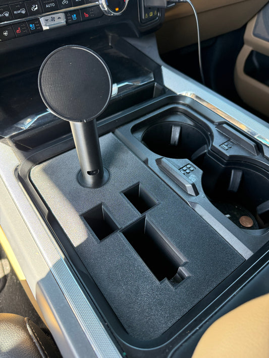 2023 Ford Super Duty center console insert with integrated phone mount and pistol holder slot