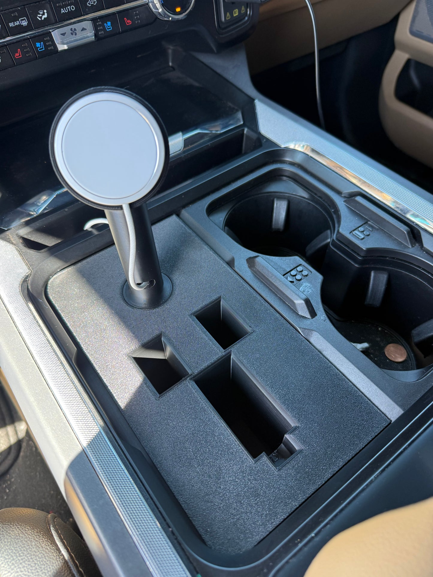 Ford Super Duty tactical center console organizer with phone holder and secure pistol slot